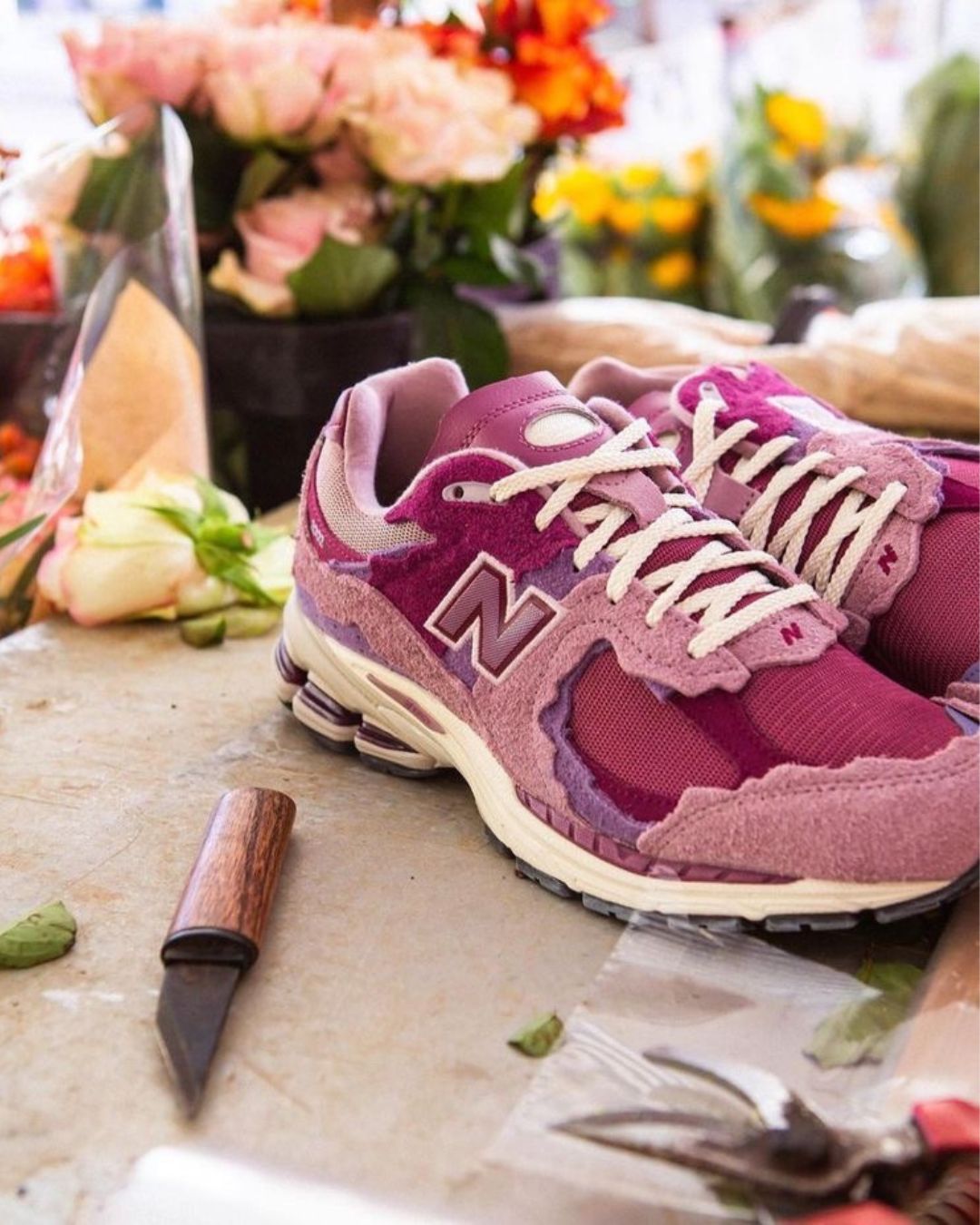 New balance 574 uomo rosa online