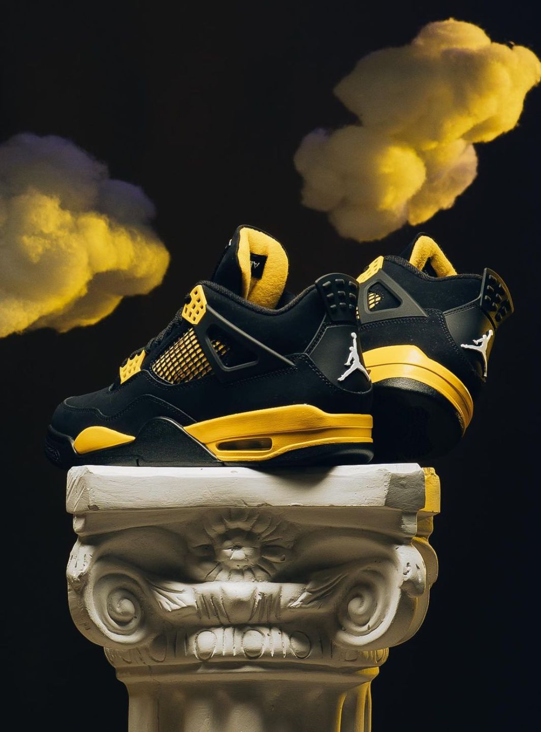 Black and yellow jordan 4 deals